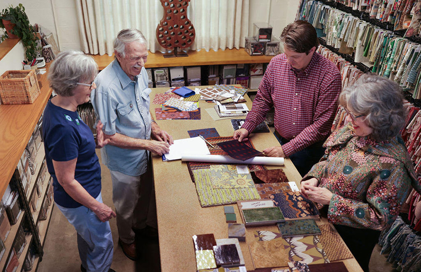 Aging-in-Place Remodeling Planning & Consultation Austin TX | Age in Place in Style Homeowners and aging-in-place specialists reviewing material selections and remodeling plans during a design consultation in Austin, TX